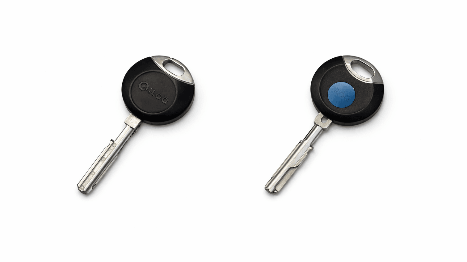 Bilden innehåller två iloq-nycklar